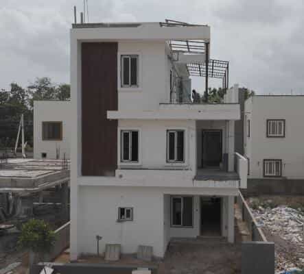 Modern house under construction by DRR Constructions in Hyderabad